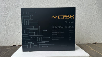 A black ANTPAK 12.8V 210Ah LiFePO4 lithium battery 
