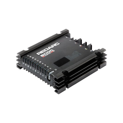 Black electronic module with 'Redarc' branding on a white background