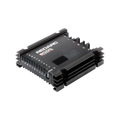 Black electronic module with 'Redarc' branding on a white background