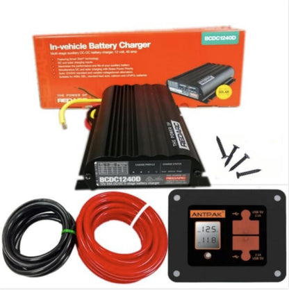 In-vehicle battery charger with packaging, cables, and display unit on a white background