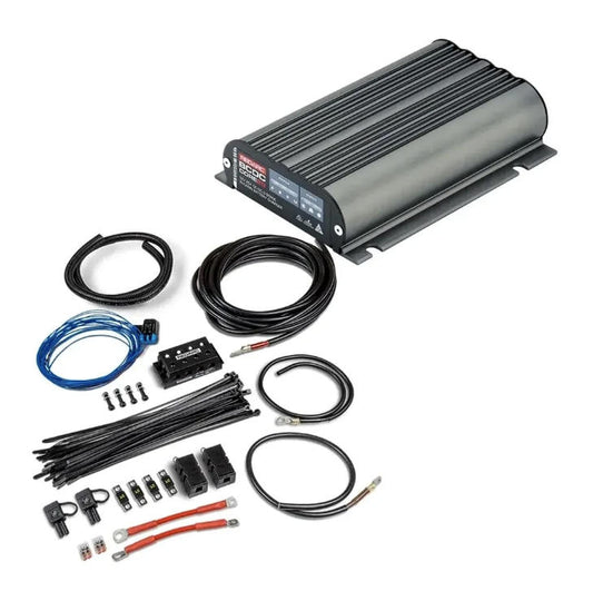 Car audio amplifier kit with cables and connectors on a white background