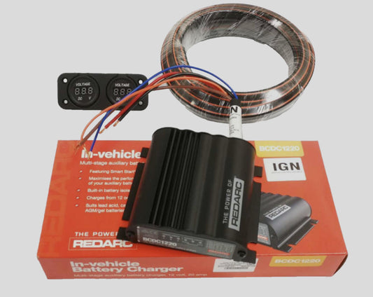 Redarc in-vehicle battery charger with wiring and display on a white background